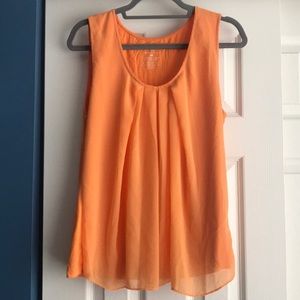 Orange sleeveless blouse